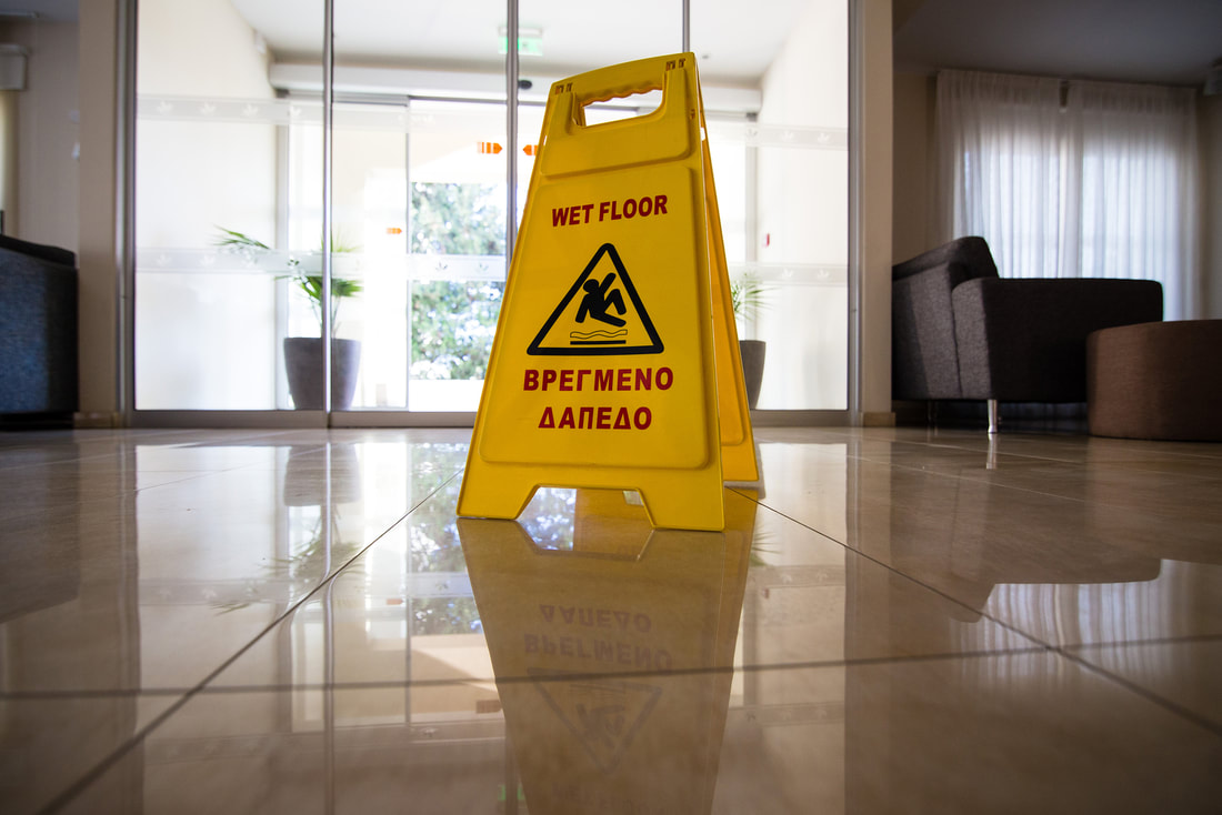 Safety sign to notify the floor is wet after a deep tile cleaning