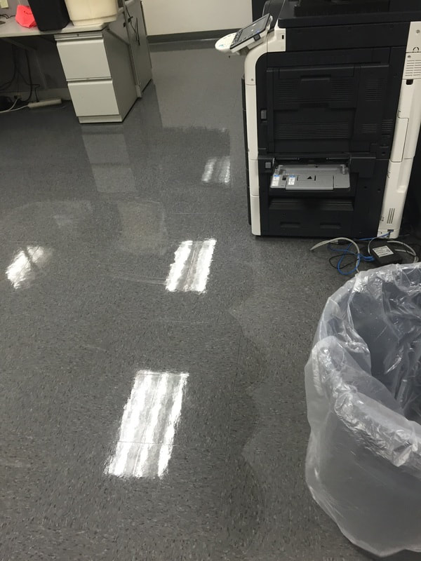 Glossy clean tile floor in a school for annual cleaning.