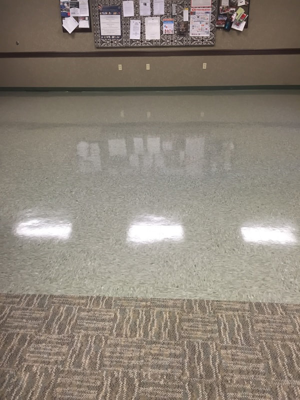 Shined tile cleaned by janitor with deep clean.